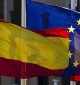 The Spanish and EU flags.