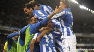 Real Sociedad celebrate after scoring against Athletic Bilbao.